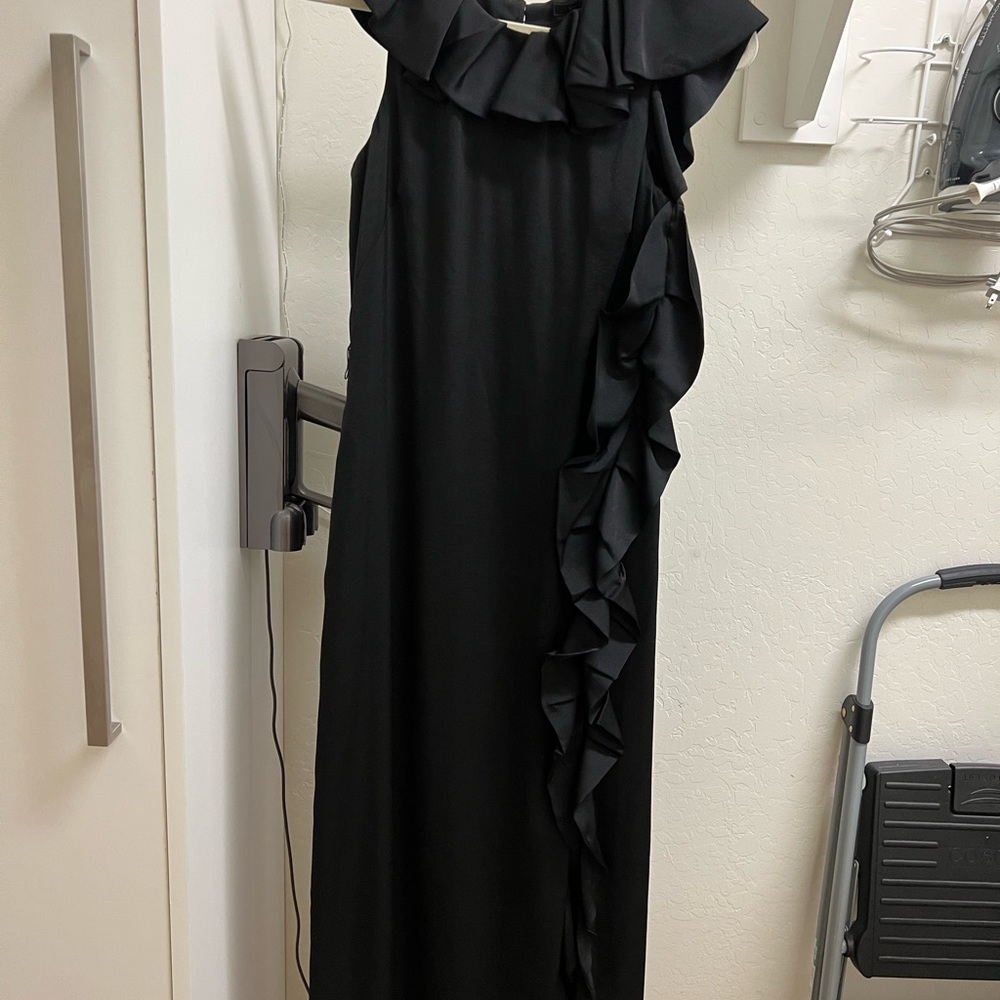 Wore for a wedding and never worn since
